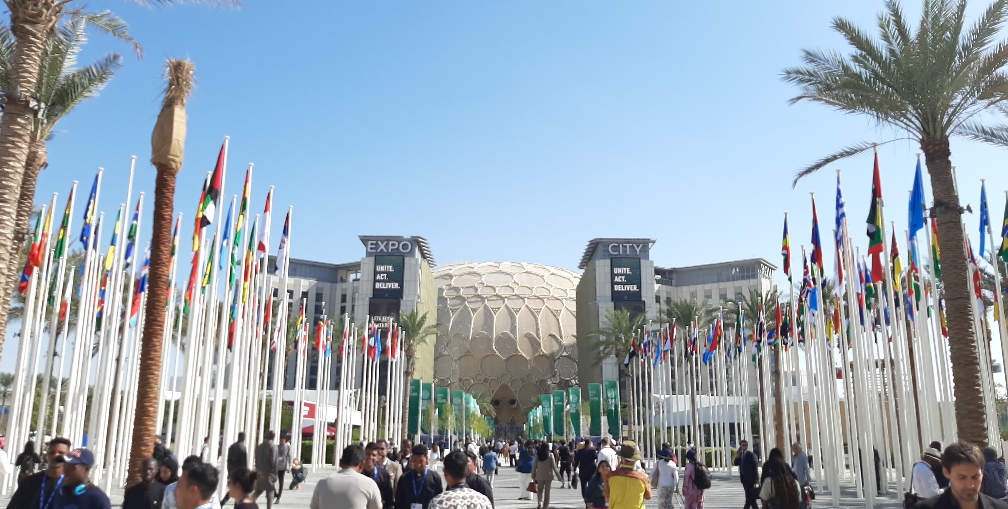 Delegates on the main esplanade of Expo City in Dubai, the COP28 Blue Zone