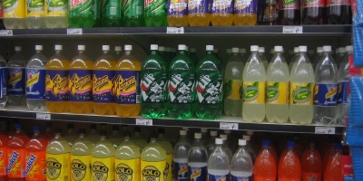 Image: SMC at English Wikipedia, Soft drinks on shelves in a Woolworths supermarket, Wikimedia Commons, Public domain