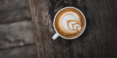 Image: Burst, White mug on brown wooden table, Pexels, Creative Commons Zero