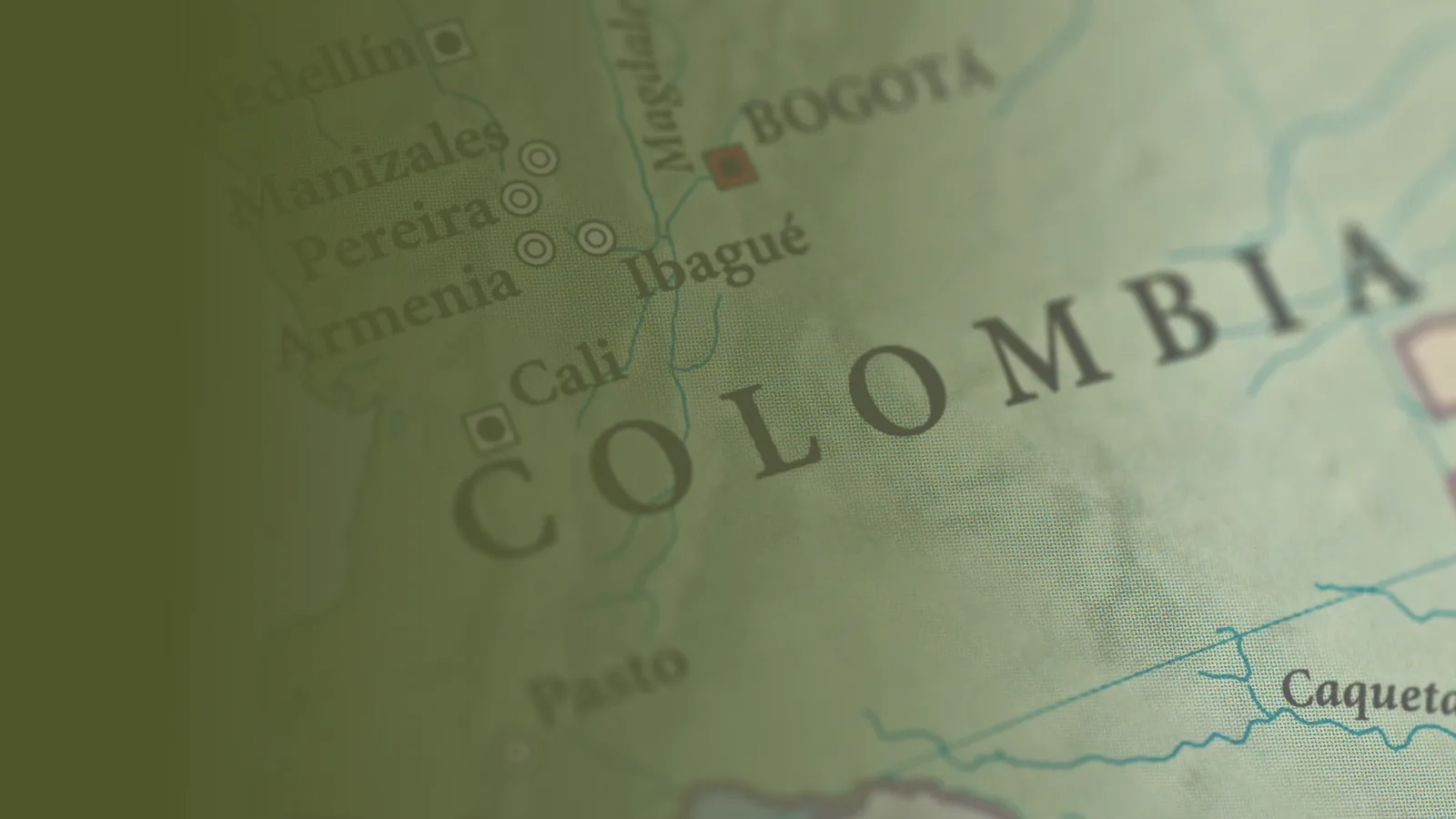 A map of Colombia with a green gradient filter on top.