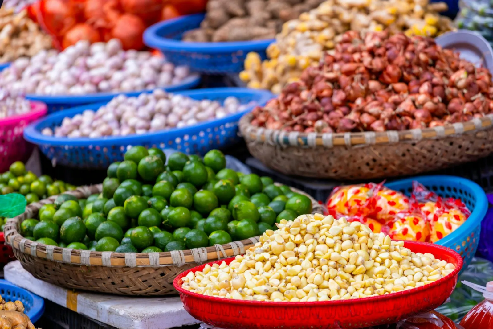 Garlic and limes in basket at market. Credit: Hồng Quang Official via Pexel