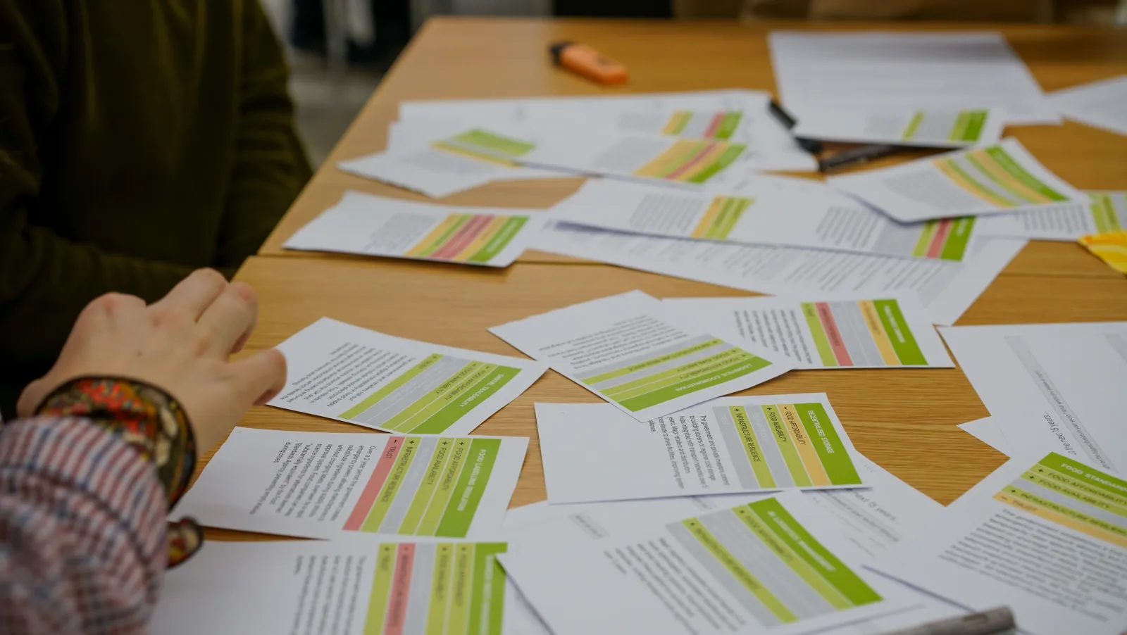 A close up of a spread of cards used by participants in the game Barefood at the serious games workshop at the Oxford Martin School on 17 Feb 2026. Photo by Jacquelyn Turner.