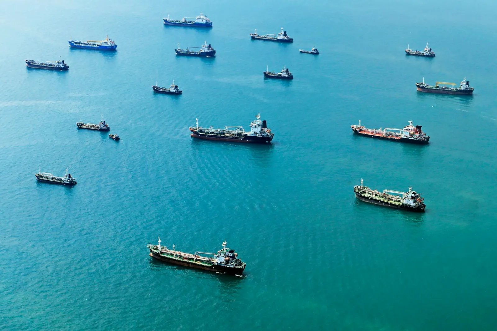Ships in blue water: Jeffry Surianto via Pexels