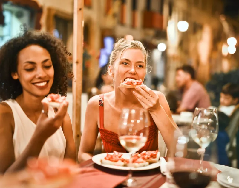 Image: Adrienn, Woman Eating Bruschetta, Pexels, Pexels Licence