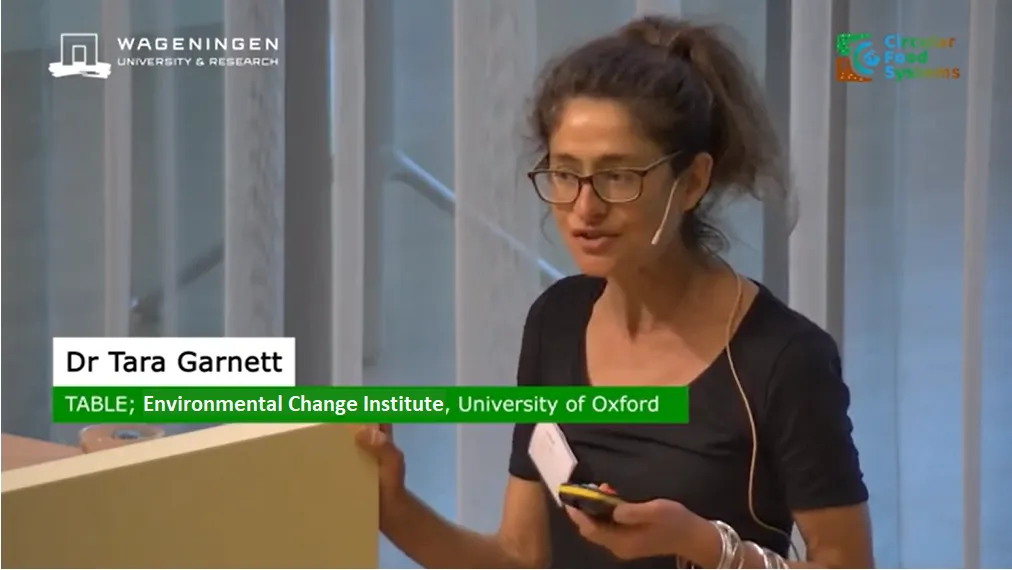 Image of Tara Garnett giving a talk at the WUR symposium