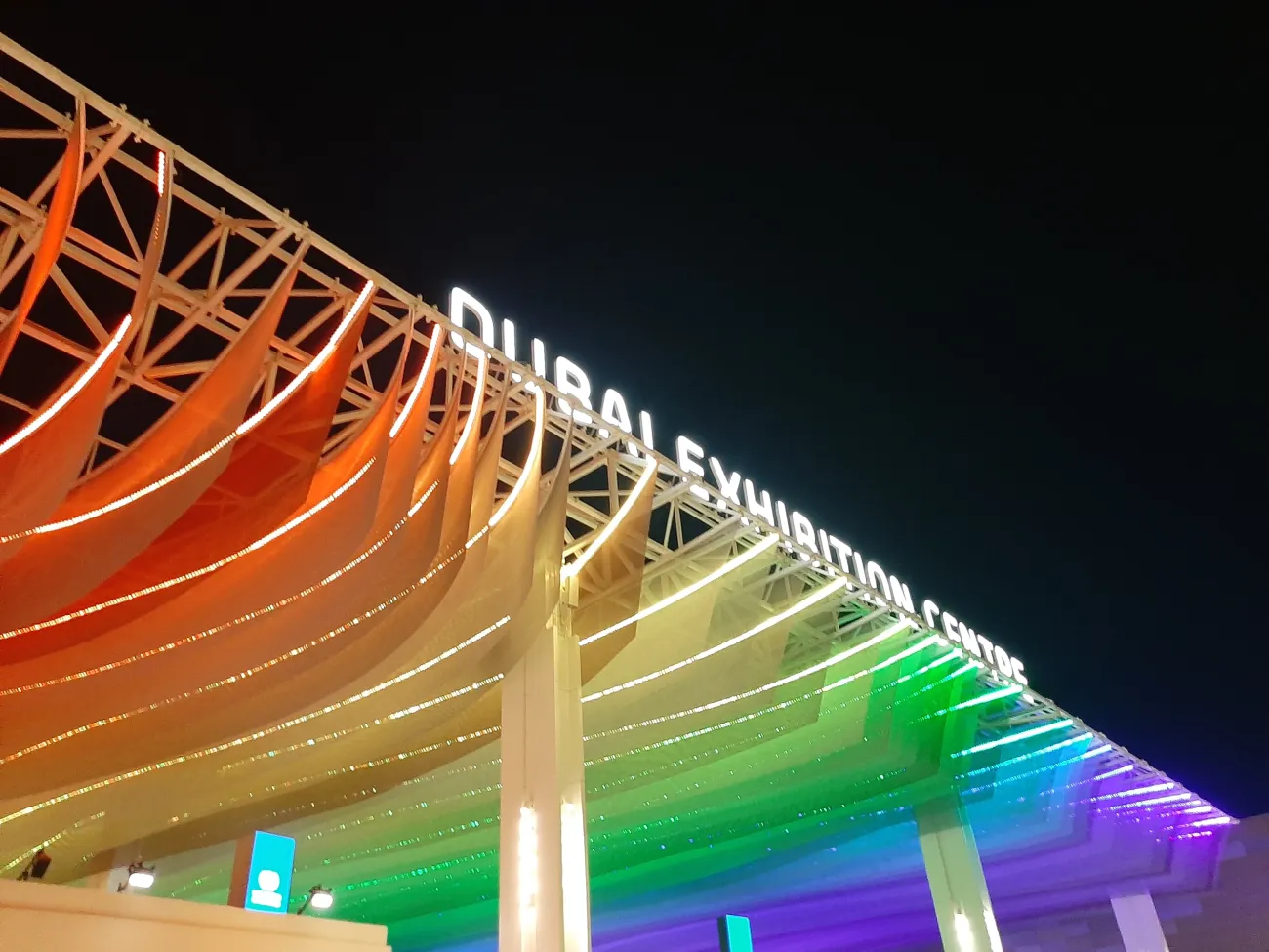 A photo of the Dubai Exhibition Centre lit up at night. Photo by Ruth Mattock.