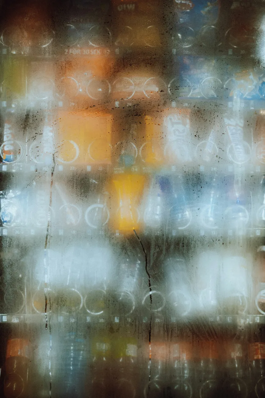 The misted glass of a vending machine. Photo by Fredrik Ohlander via Unsplash.