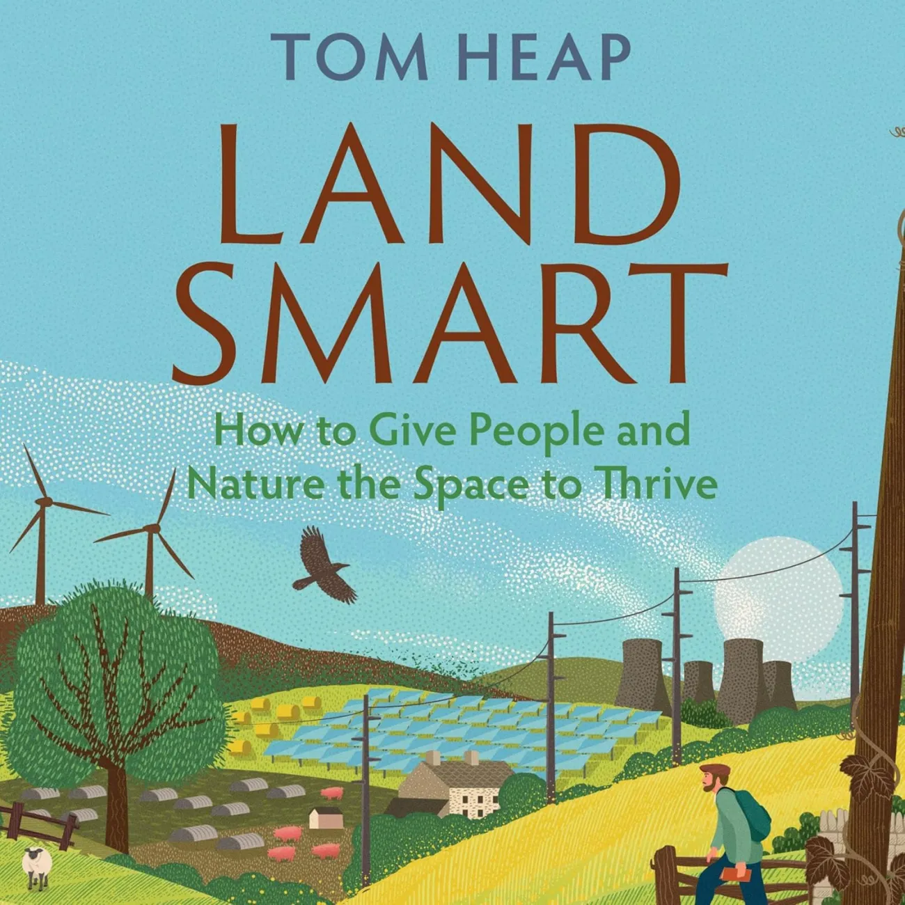 Front cover of book titled Land Smart; photo of a field with solar panels beside food and trees