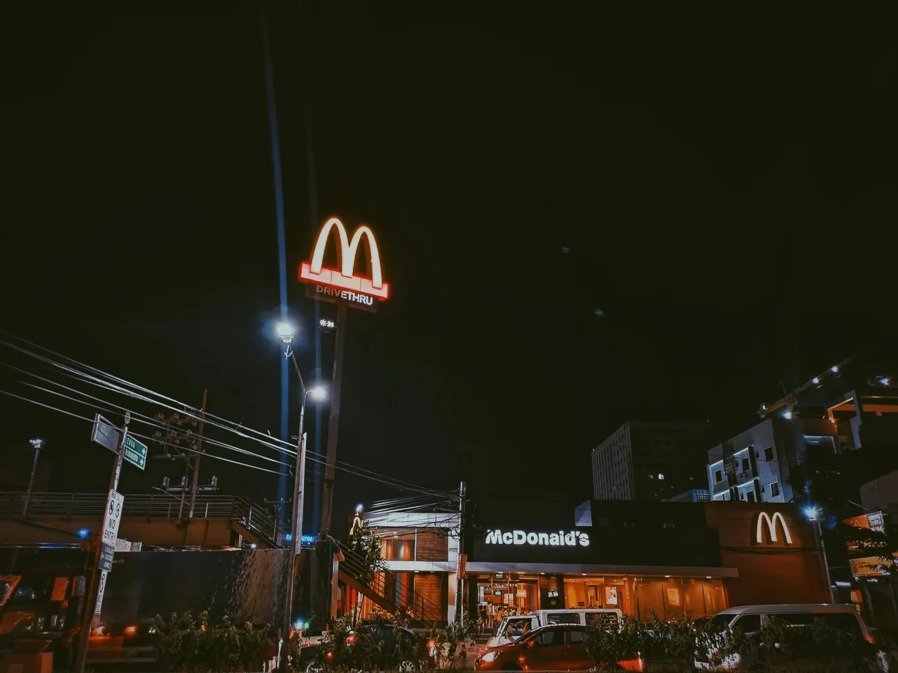 Photo of Mcdonald's branch at night. Credit Mikechie Esparagoza via Pexels