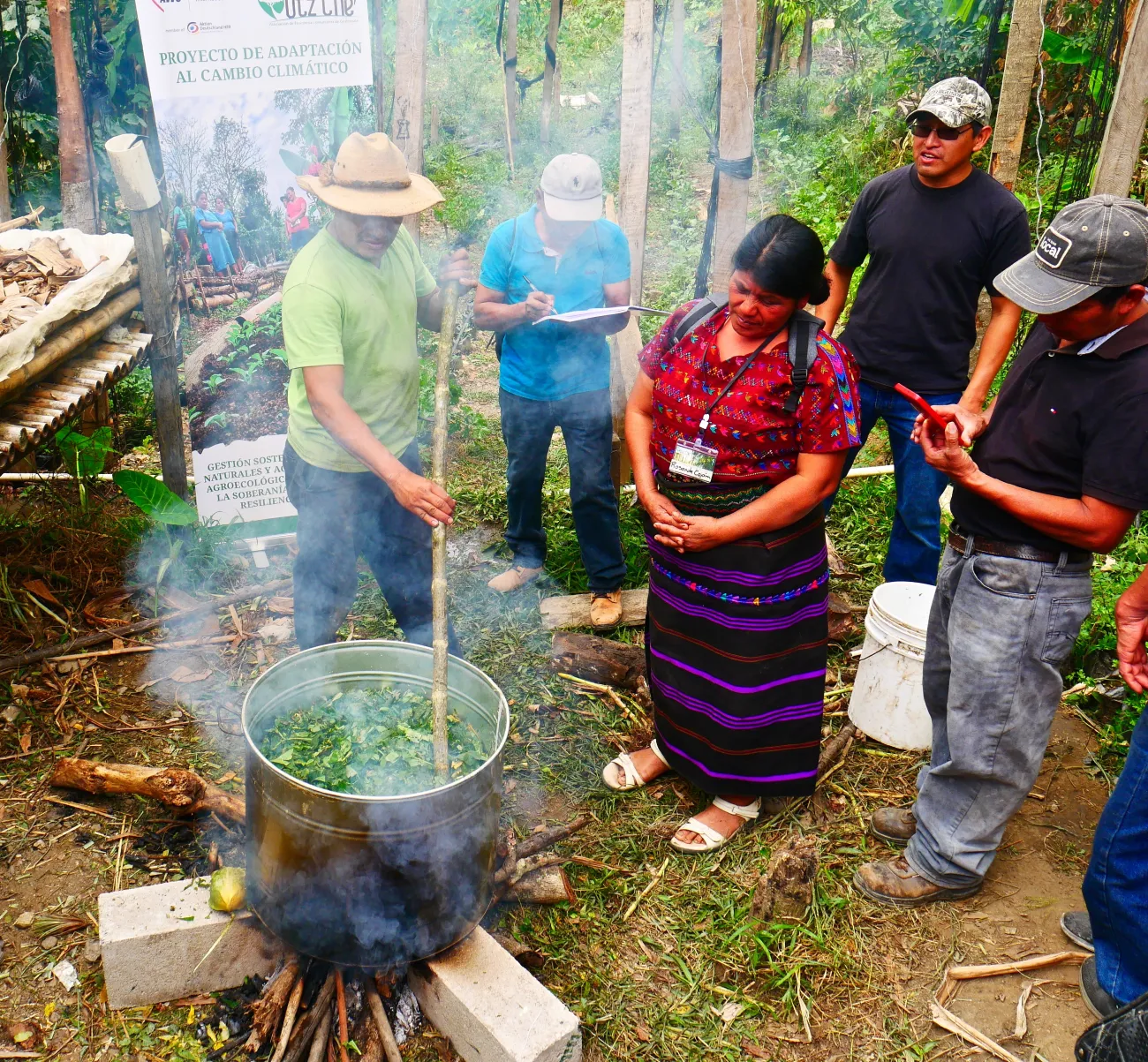 Alfredo Cortez, a Maya-Achi farmer and community leader, prepares a bio-input by boiling aromatic herbs at a biofabrica workshop. Photo provided courtesy of Nathan Einbinder.