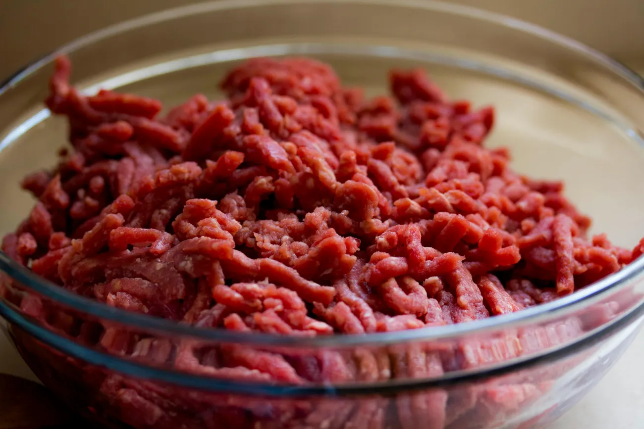 Photo of raw meat in a bowl. Credit: Angele J via Pexels