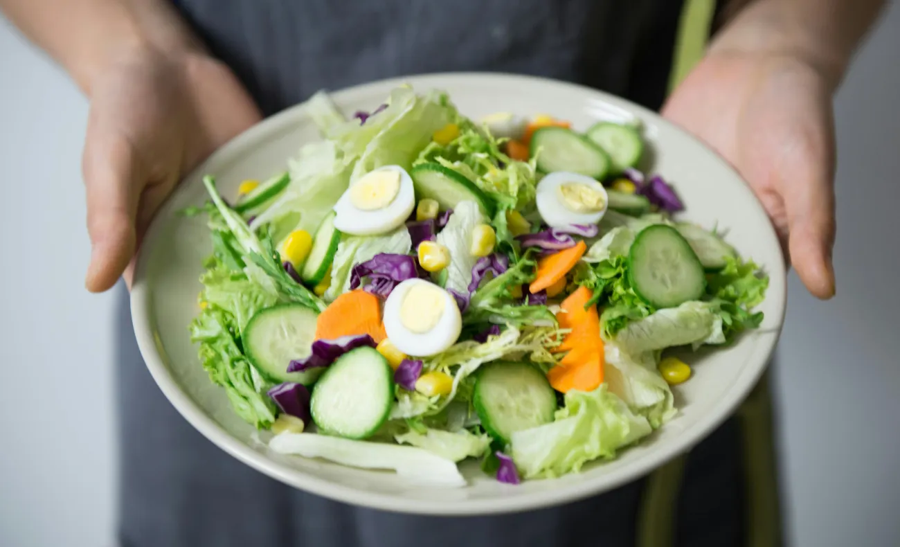 Plates of veggies. Credit: Catcoming via Pexels. 