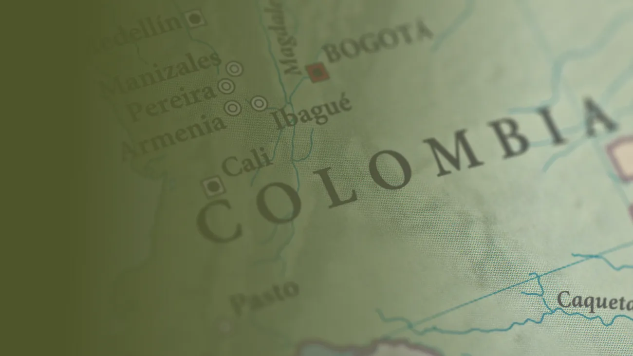 A map of Colombia with a green gradient filter on top.