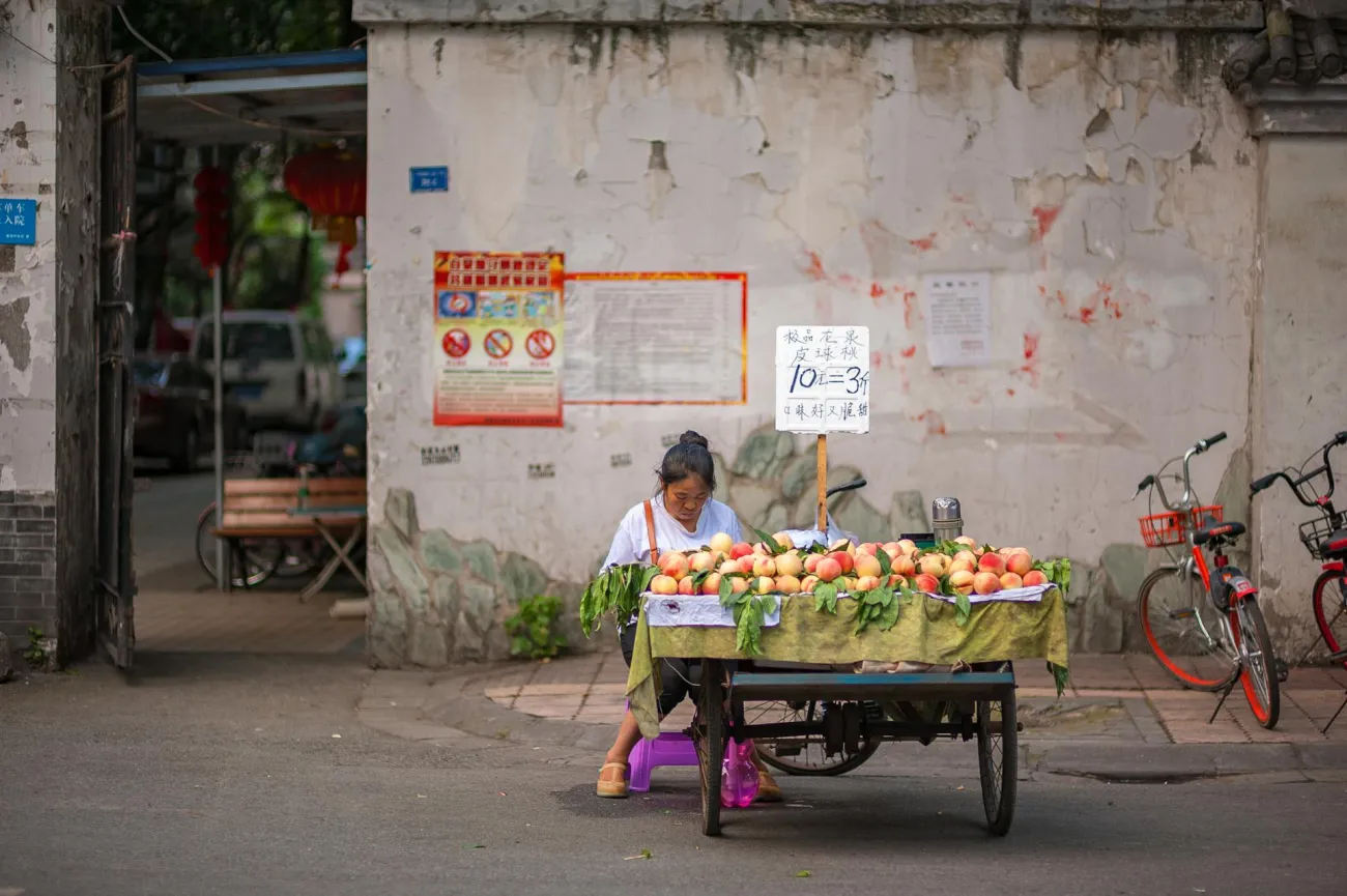Fruit vendor in China. Credit: Vincent Tan via Pexels. 