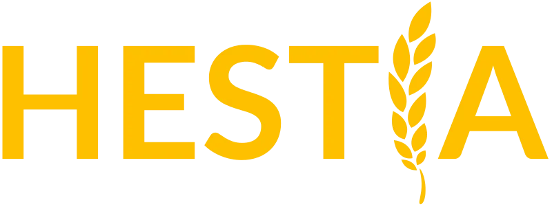 HESTIA logo, the word 'HESTIA' in bright yellow text with the "I" replaced by an image of a ear of wheat