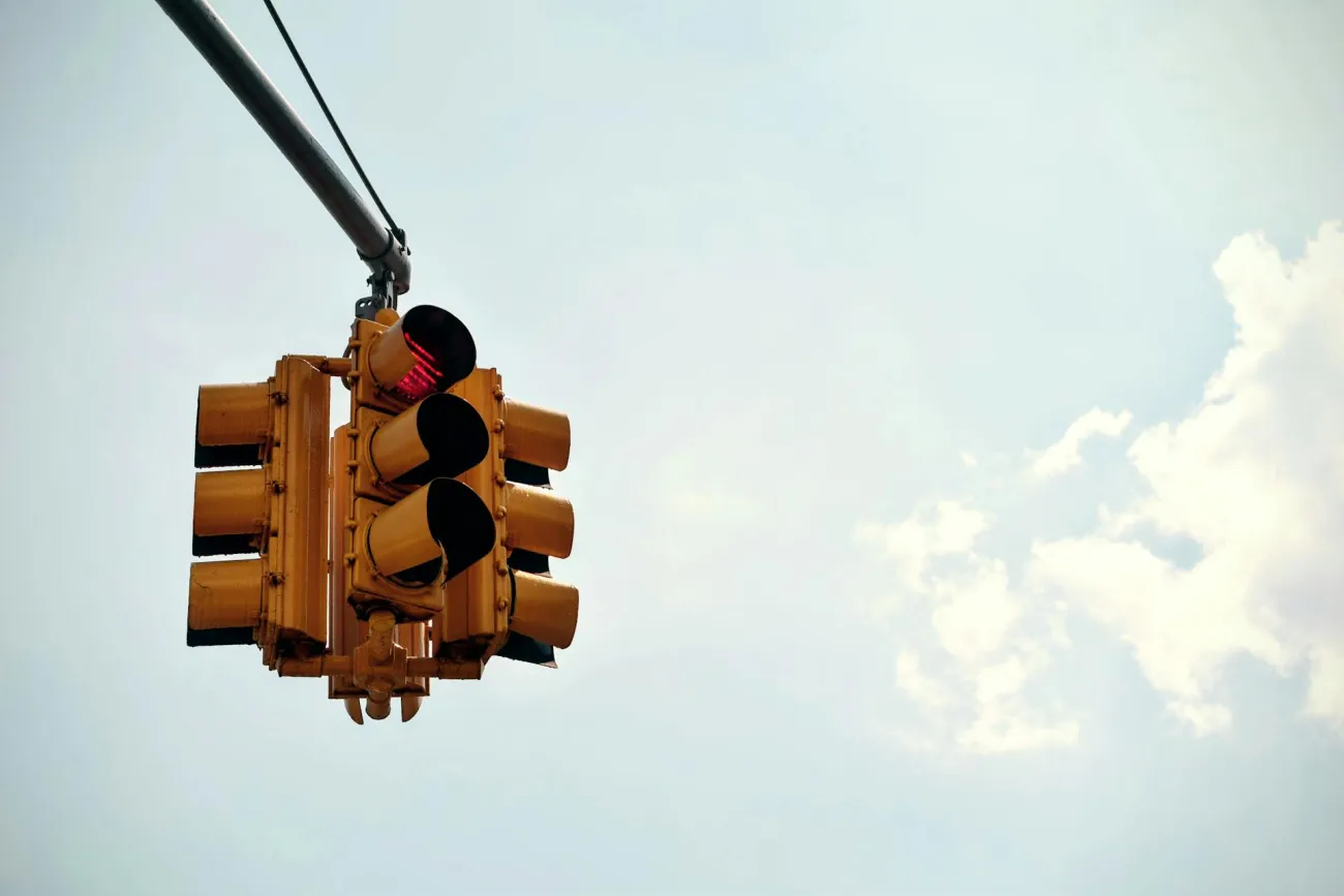 Traffic lights with sky behind: Credit: Tom Gouw via Pexels