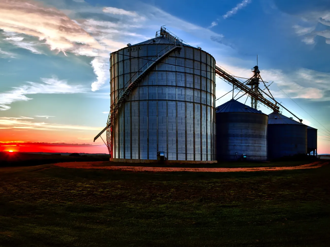Grain silo with sunset. Credit: Pixabay via Pexels