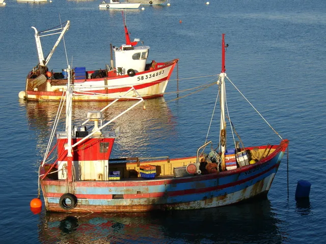 Photo: fklv, two fishing boats, Flickr, Creative Commons License 2.0 generic.