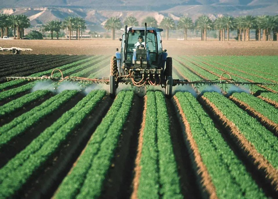 Image: Jeff Vanuga, Pesticide application on leaf lettuce in Yuma, Az., Public Domain Files, Public Domain