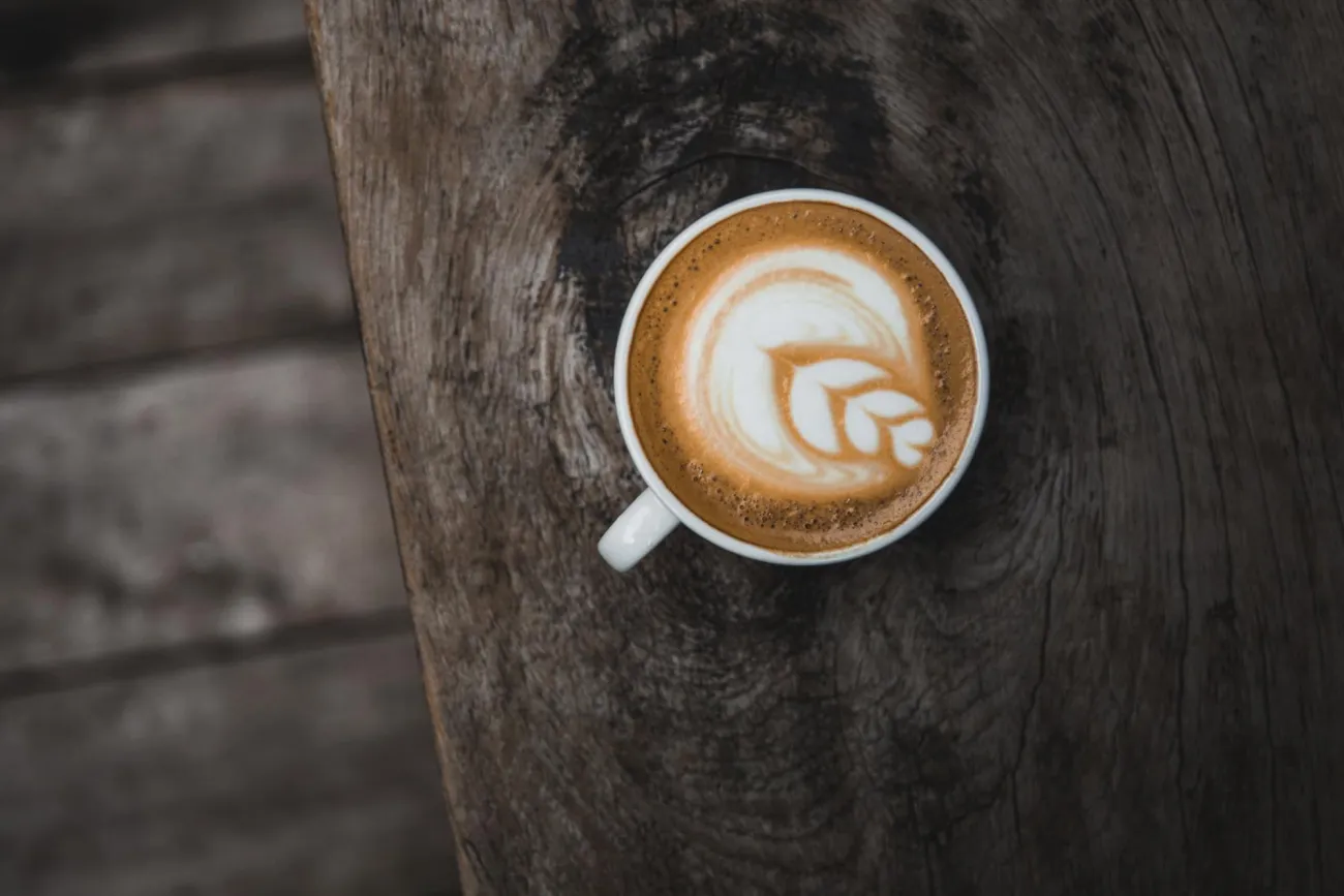 Image: Burst, White mug on brown wooden table, Pexels, Creative Commons Zero