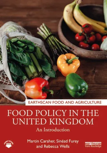 The cover to Food Policy in the United Kingdom, showing fruit including peppers, bananas and tomatoes.