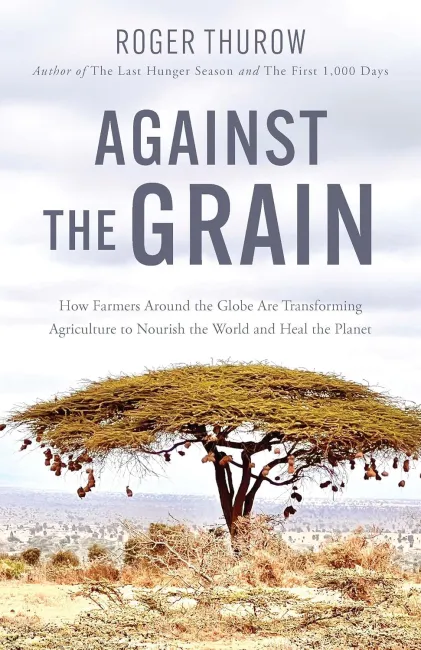 Title page of book with an African landscape and tree