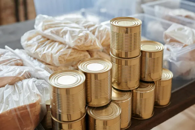 Food bank and cans: Credit: Julia M Cameron via Pexels